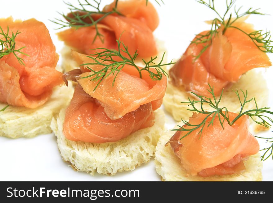 Fresh salmon slice on bread decorate with dill. Fresh salmon slice on bread decorate with dill