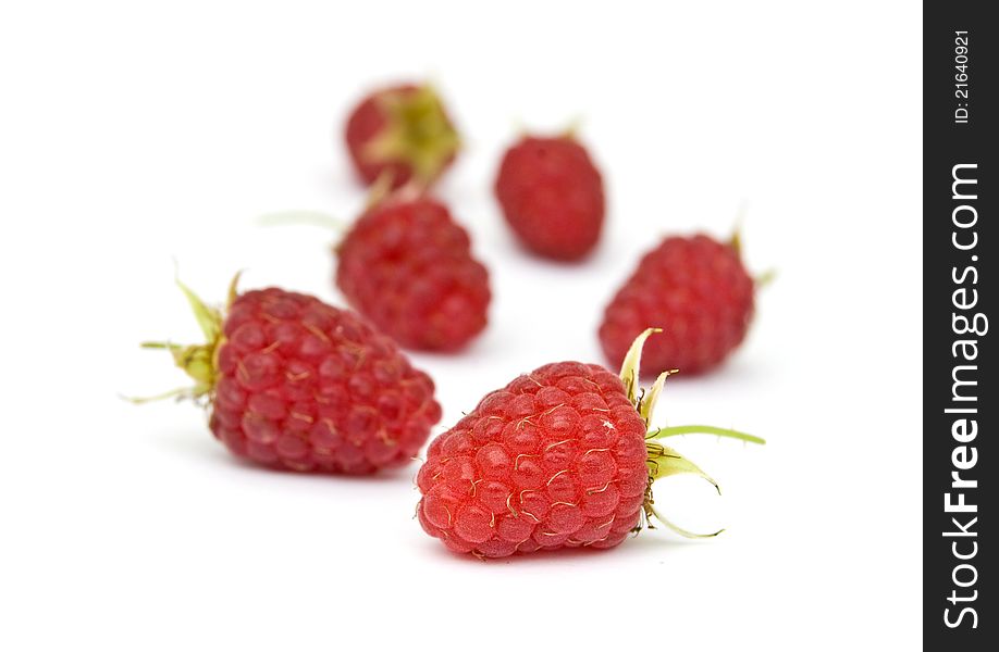 Fresh, ripe raspberries on white