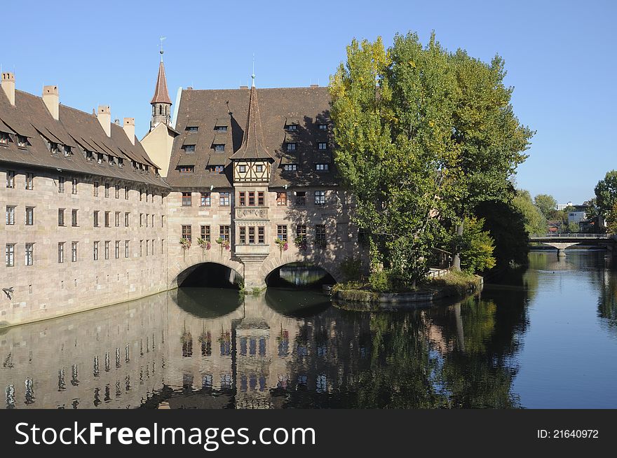 Medieval house by the water in the Franconian city of Nuremberg. Part of the house ist built across the river. Nuremberg is very popular with tourists. Medieval house by the water in the Franconian city of Nuremberg. Part of the house ist built across the river. Nuremberg is very popular with tourists.