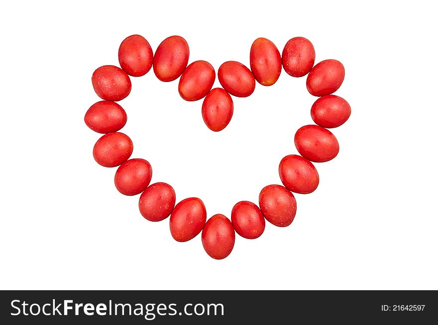 Red candy, located in heart shape