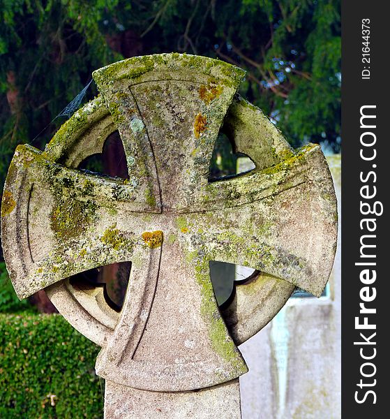 Stone Weathered Celtic Cross with natural background