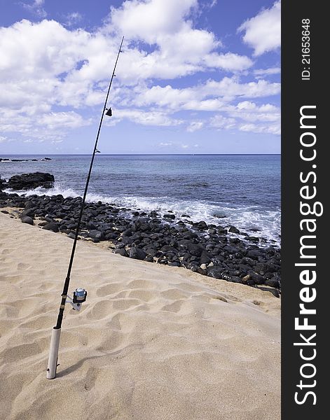 Fishing Pole On Sandy Beach