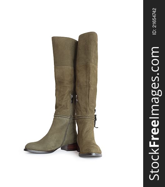 Nice new female olive green high boots. Isolated on white with clipping path. Nice new female olive green high boots. Isolated on white with clipping path