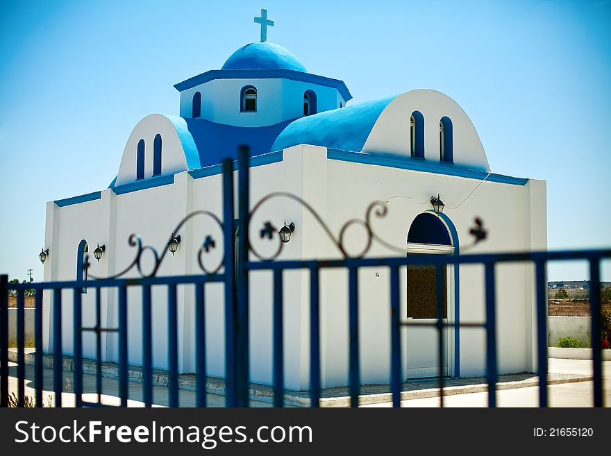 Beautiful small church behind the fence, somewhere on island Kos, Dodecanese, Greece. Beautiful small church behind the fence, somewhere on island Kos, Dodecanese, Greece