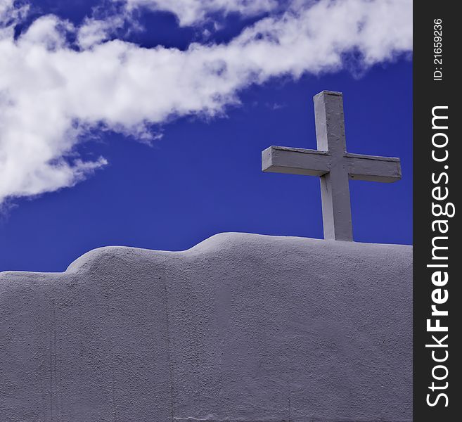 A White Cross Against A Blue Sky. A White Cross Against A Blue Sky