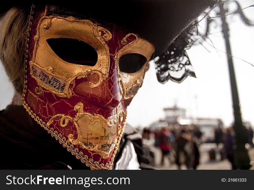 Venetian traditional gold and red mask used for carnival in Venice, Italy. Venetian traditional gold and red mask used for carnival in Venice, Italy