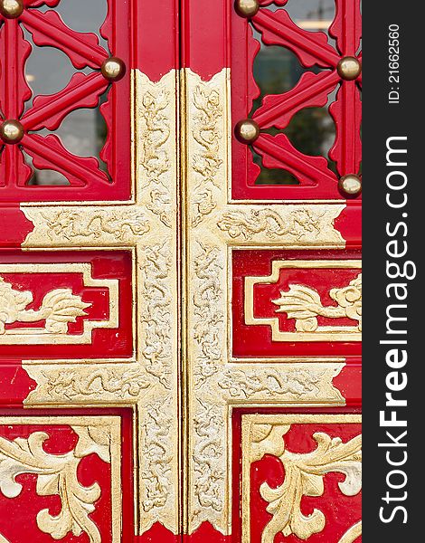 Red door with yellow Chinese Decorative pattern. Red door with yellow Chinese Decorative pattern
