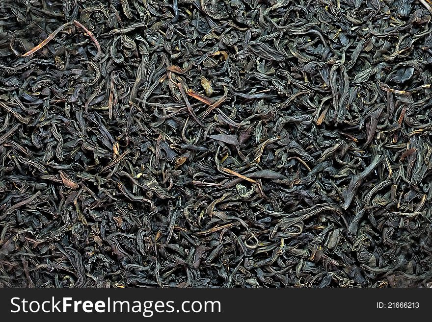 Black tea big leafs background