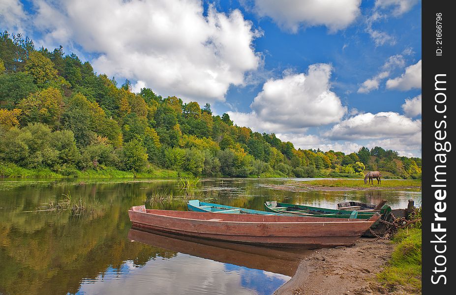 Old Boats In River