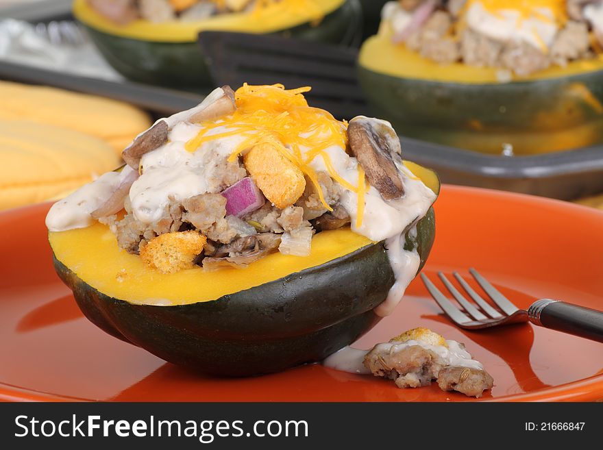 Closeup of baked stuffed squash with baking sheet in background. Closeup of baked stuffed squash with baking sheet in background