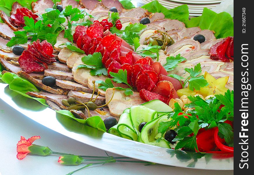 Cold appetizers from meat and vegetables