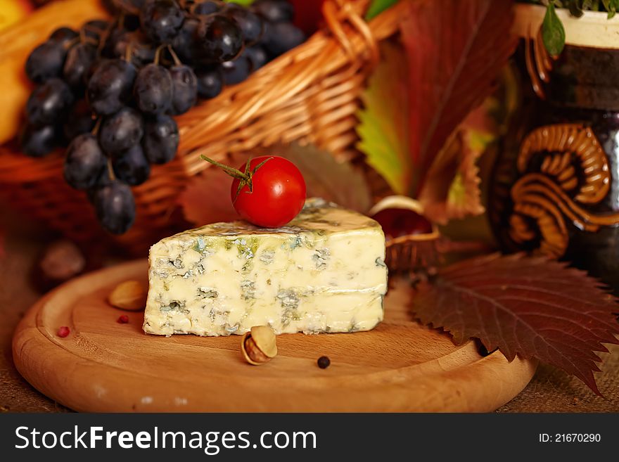 Still life with autumn vegetables , fruits and cheese. Still life with autumn vegetables , fruits and cheese