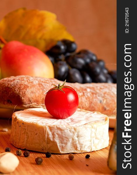 Still life with autumn vegetables , fruits  and cheese. Still life with autumn vegetables , fruits  and cheese