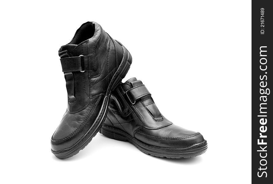 Pair of black man's boots on white background. Pair of black man's boots on white background