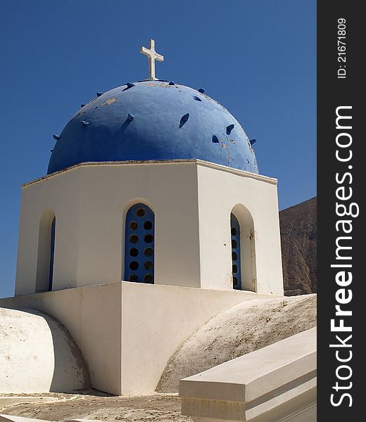 Blue and White Greek Church Against Blue Sky