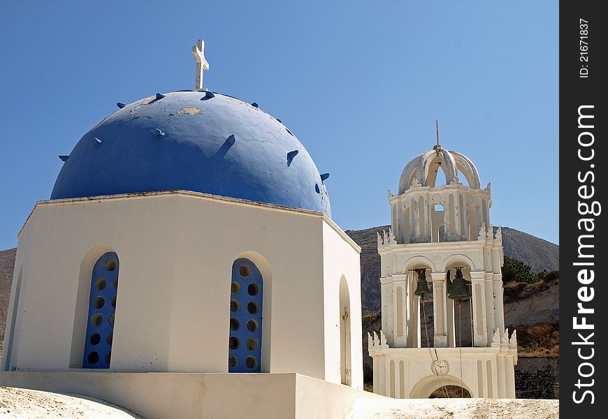 Blue and White Greek Church Against Blue Sky