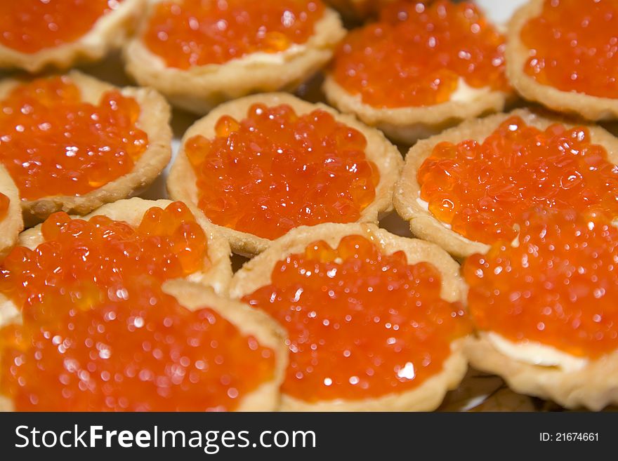 Tartlets with red caviar