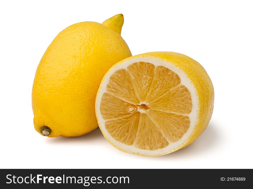 Two lemons against white background