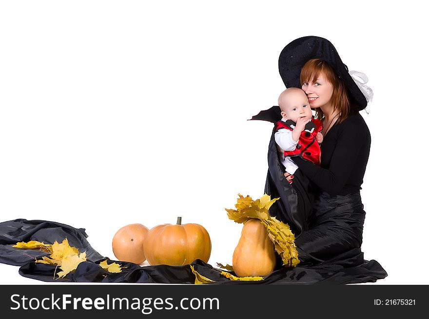 Halloween Baby With Mother Near Pumpking