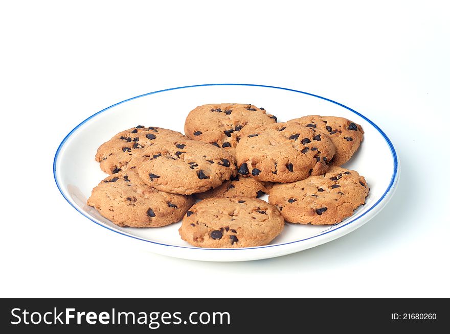 Cookie chips with dark chocolate on plate. Cookie chips with dark chocolate on plate