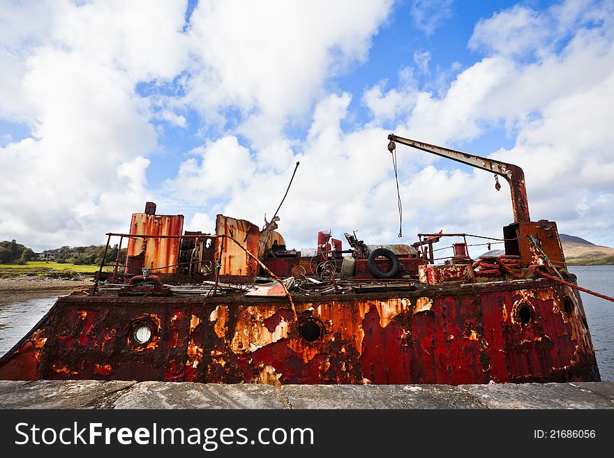 Rusty Ship Wreck at the pier in Connamara, Ireland