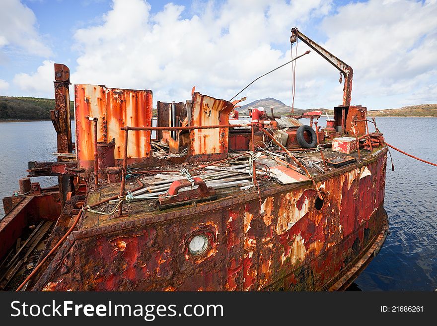 Rusty Ship Wreck at the pier in Connamara, Ireland