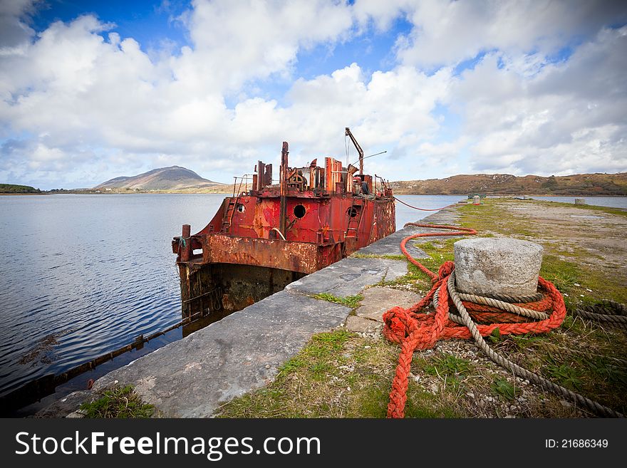 Rusty Ship Wreck at the pier in Connamara, Ireland