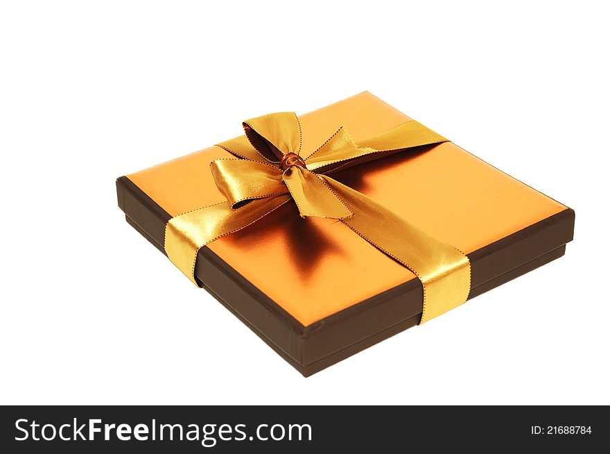 Gift box with gold  ribbon, on a white background