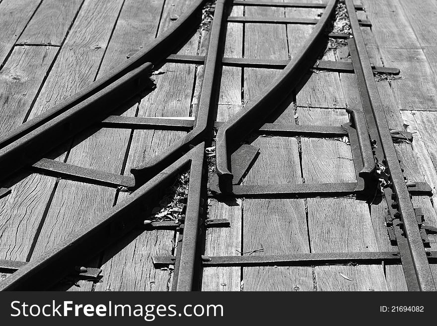 A railroad intersection of a former wharf in Sydney, Australia (black-and-white shot). A railroad intersection of a former wharf in Sydney, Australia (black-and-white shot)