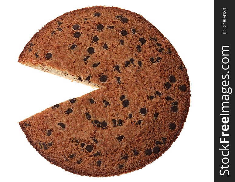 Upper view of a French round cake with a piece missing, isolated against a white background. Upper view of a French round cake with a piece missing, isolated against a white background