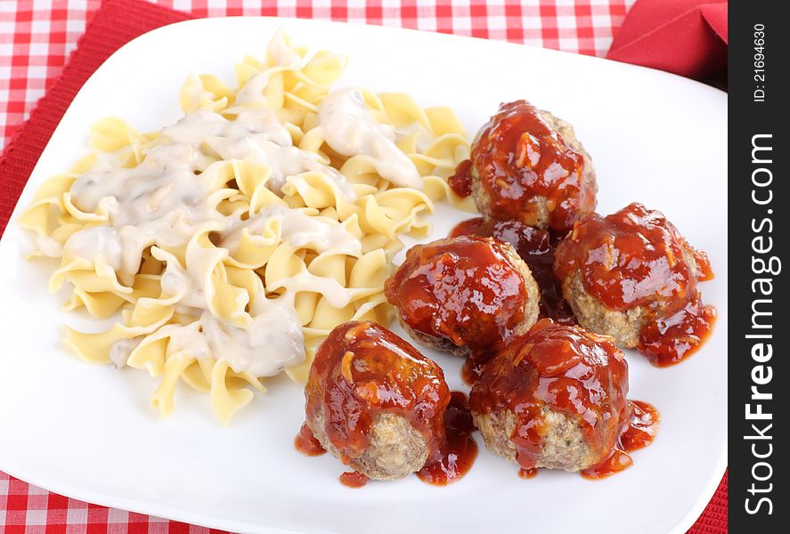 Meatballs with barbecue sauce and noodles. Meatballs with barbecue sauce and noodles