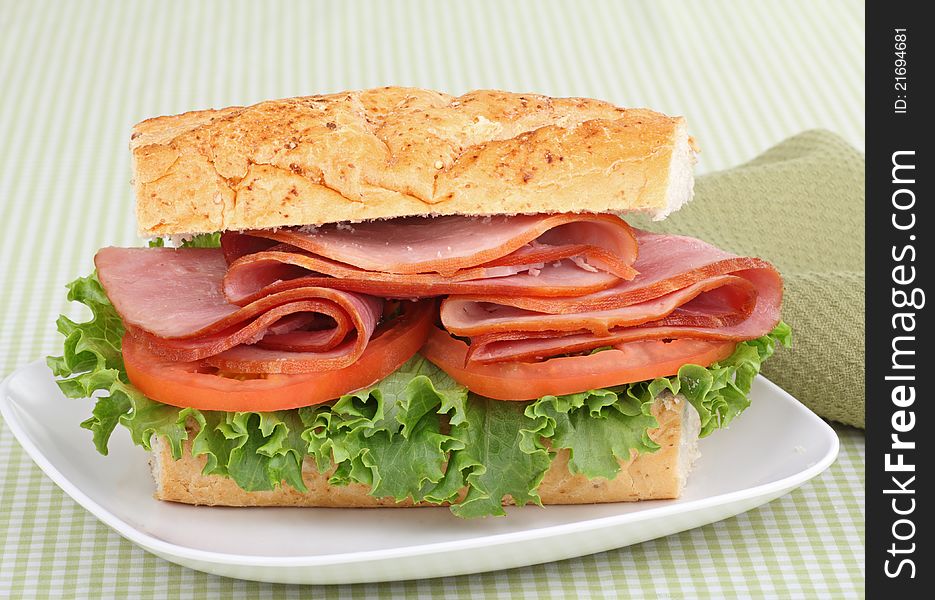 Ham, lettuce and tomato sandwich on french bread