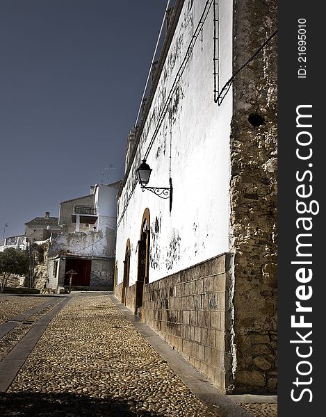 An street view of a typical andalusian village in Spain. An street view of a typical andalusian village in Spain.