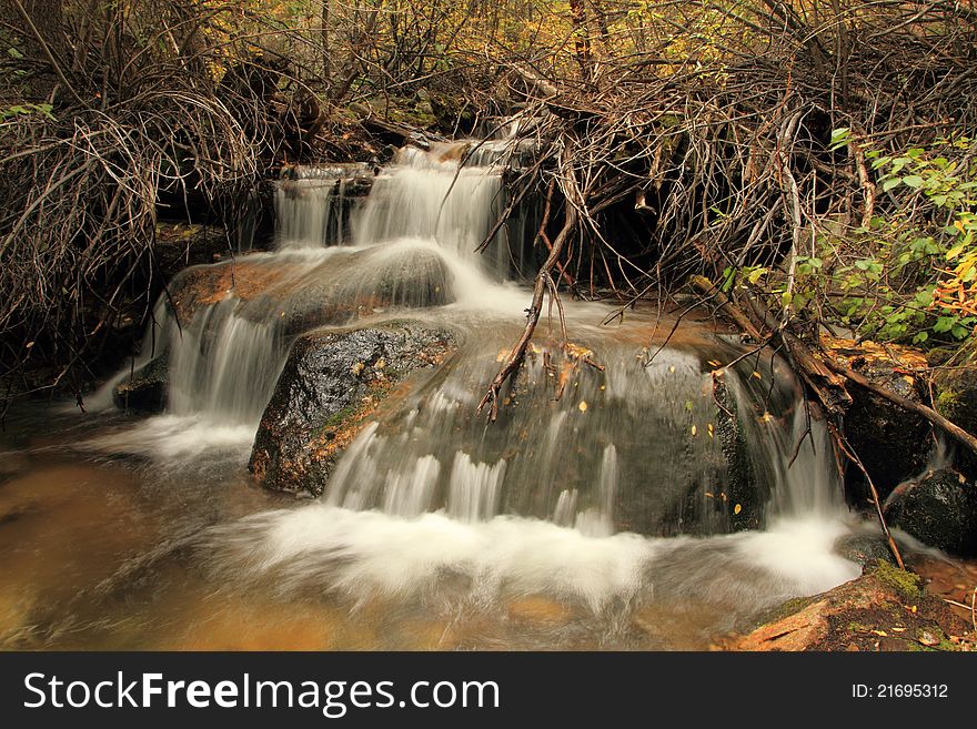 Roaring Creek in Poudre Canyon, northern Colorado, autumn. Roaring Creek in Poudre Canyon, northern Colorado, autumn