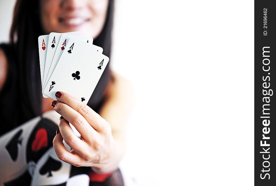 Woman with ace poker cards