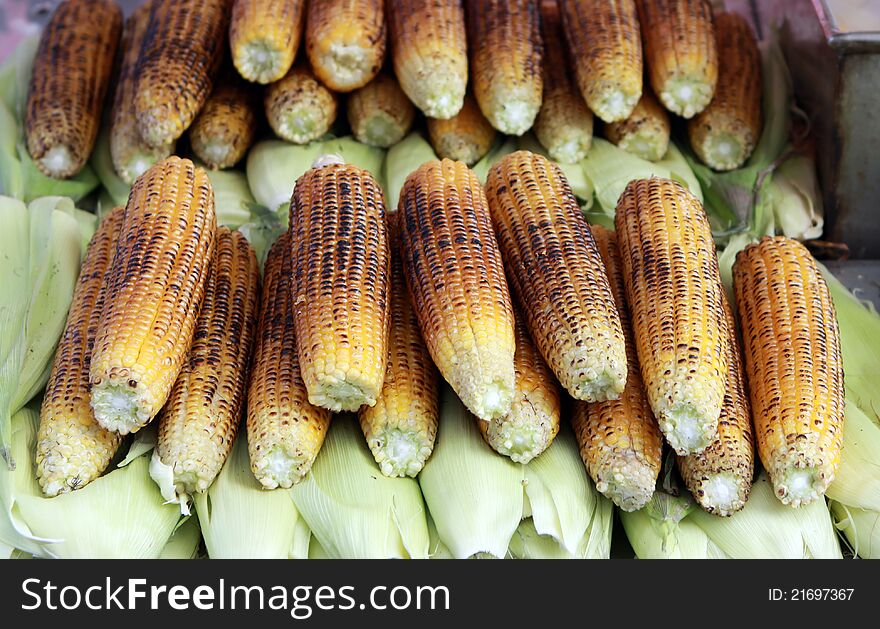 A view of roasted corn in the market. A view of roasted corn in the market.