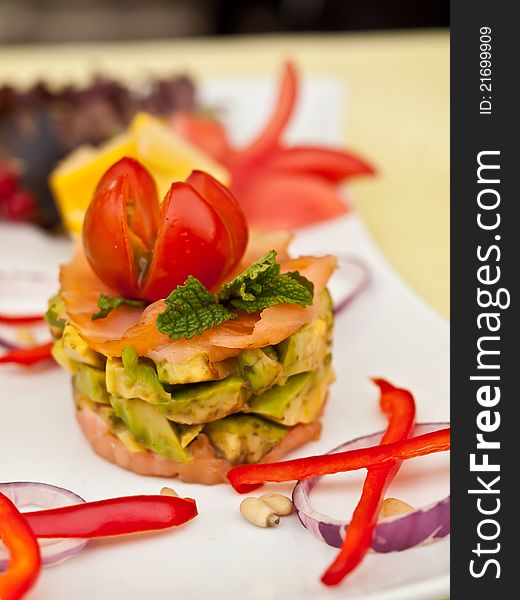 Healthy dish made with salmon, avocado and vegetables. Healthy dish made with salmon, avocado and vegetables.