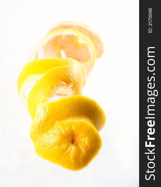 Grapefruit peel selected on a white background
