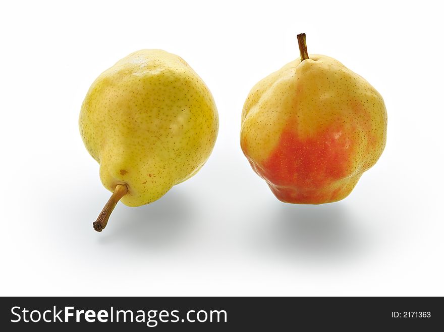 Two ripe Chinese pears on a glass table with reflection. Two ripe Chinese pears on a glass table with reflection