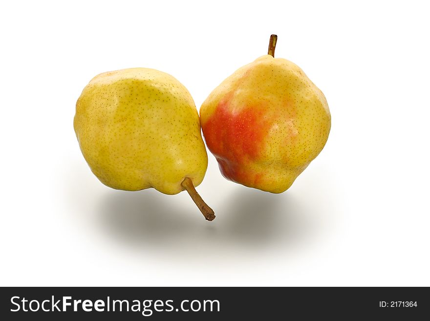 Two ripe Chinese pears on a glass table with reflection. Two ripe Chinese pears on a glass table with reflection