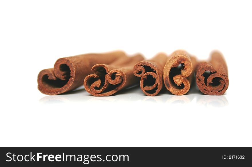 Pices of cinnamon on white backgrund