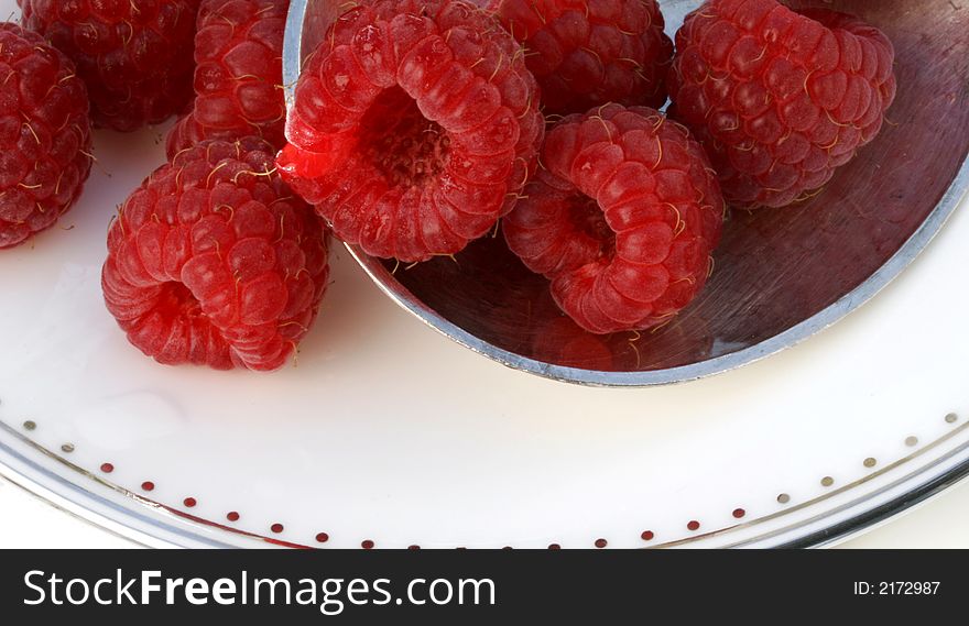 Ripe Raspberries On A Plate