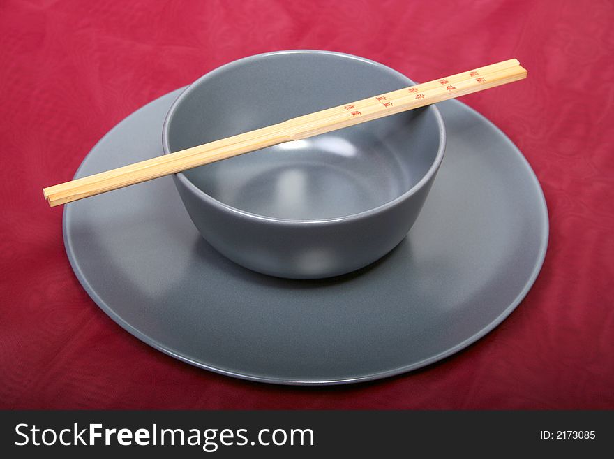 Digital photo of a bowl a pate and chopsticks. Digital photo of a bowl a pate and chopsticks.