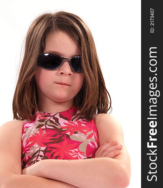 Little girl wearing sunglasses giving big attitude. Little girl wearing sunglasses giving big attitude