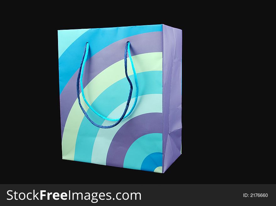 Brightly colored paper shopping bag