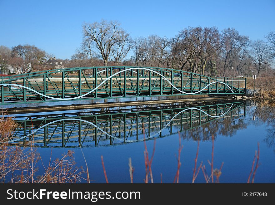 A picture of a beautiful bridge with reflections. A picture of a beautiful bridge with reflections.