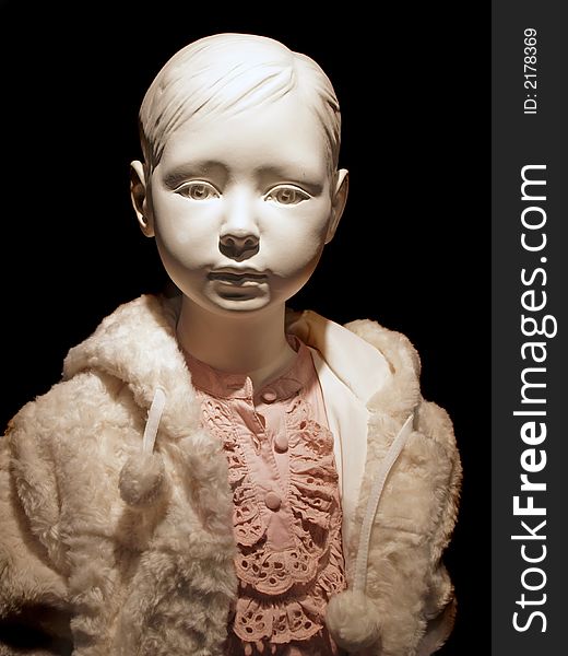 Portrait of mannequin isolated on black background