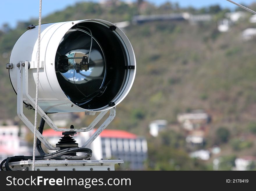 Search light attached to the side of a ship. Search light attached to the side of a ship