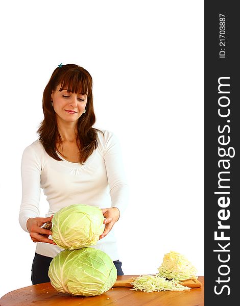 A beautiful woman holding cabbage isolated on a white background. A beautiful woman holding cabbage isolated on a white background