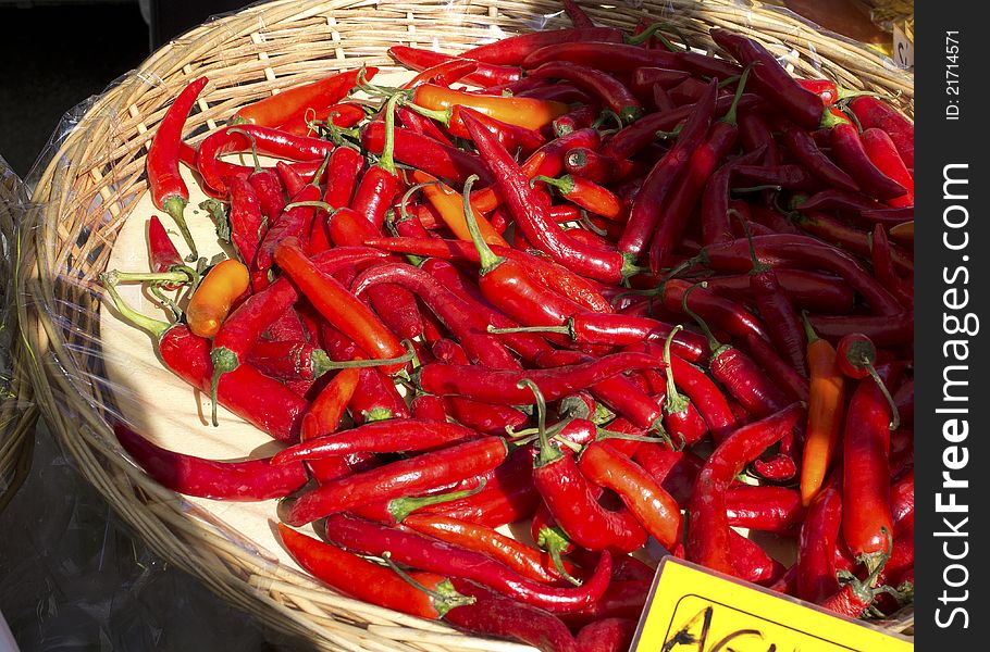 Some red chilly peppers at market place. Some red chilly peppers at market place